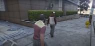 Trevor talking to the male NPC(Image via Ferzen YouTube)